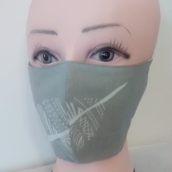 Handmade 3 layers light grey leaf reusable adult face mask.