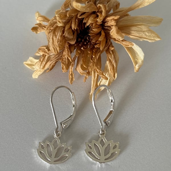 Silver lotus flower dangly earrings 