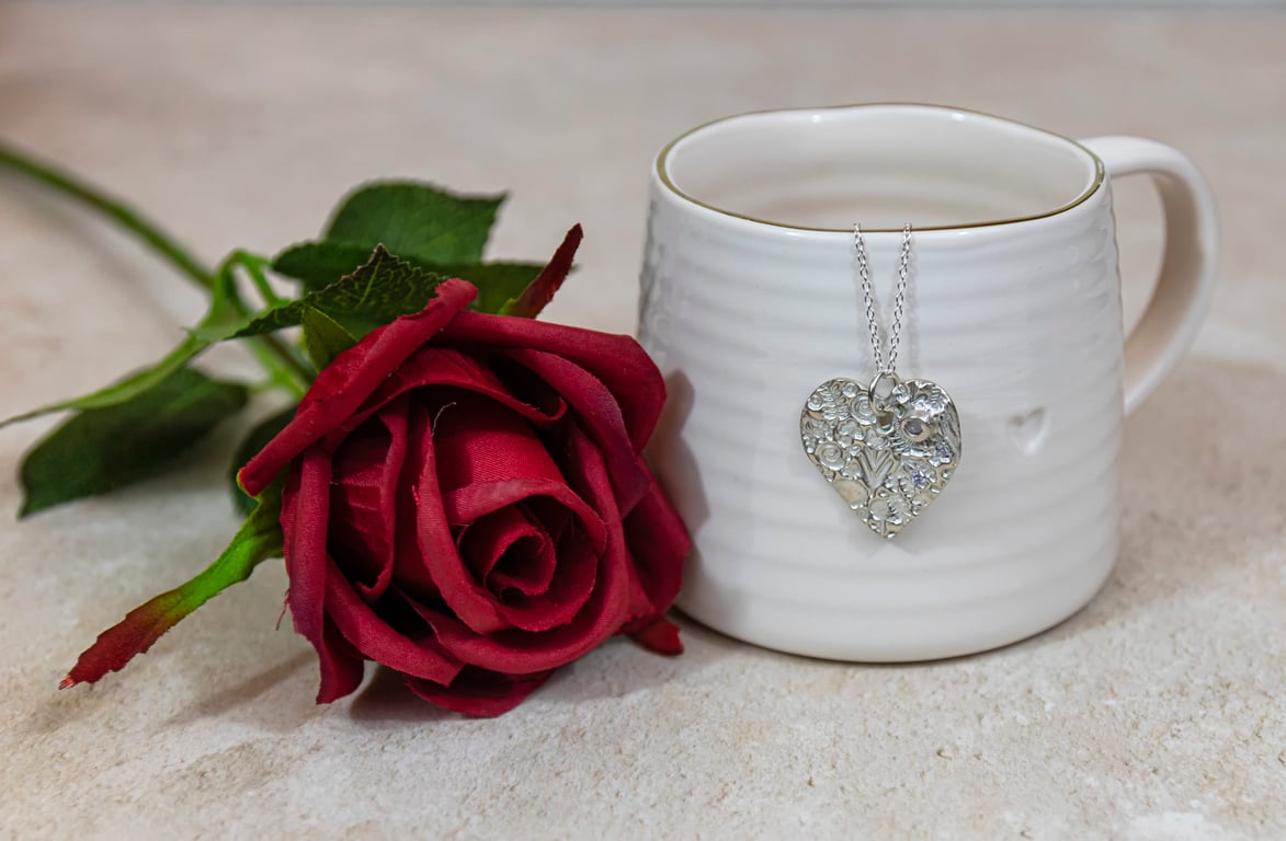 Silver textured heart necklace with tiny sparkly stones and 925 silver chain