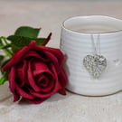 Silver textured heart necklace with tiny sparkly stones and 925 silver chain