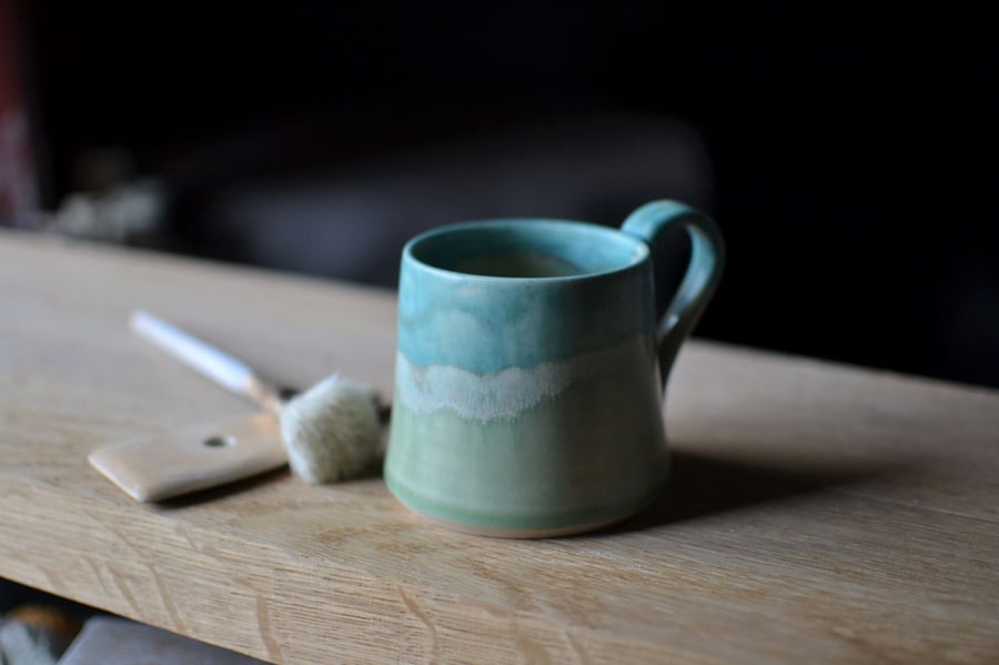 skyline cup - glazed in beautiful turquoise and greens a