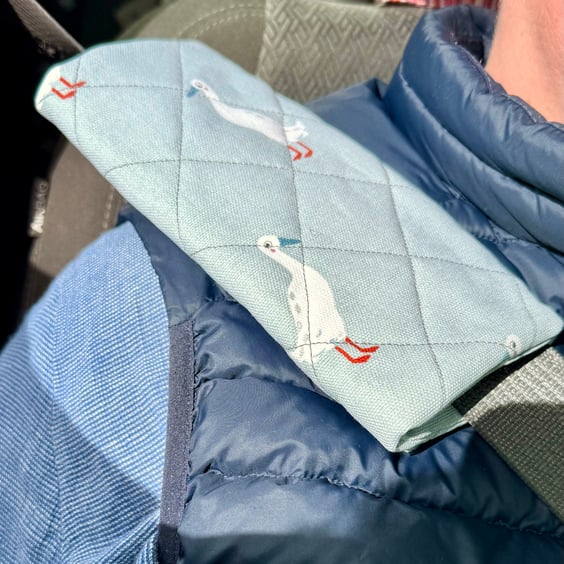 Pair of quilted seatbelt pads - runner ducks with red feet and blue beak