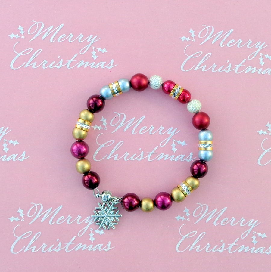 Christmas bracelet. Red, silver, gold beads, magnetic clasp with snowflake charm