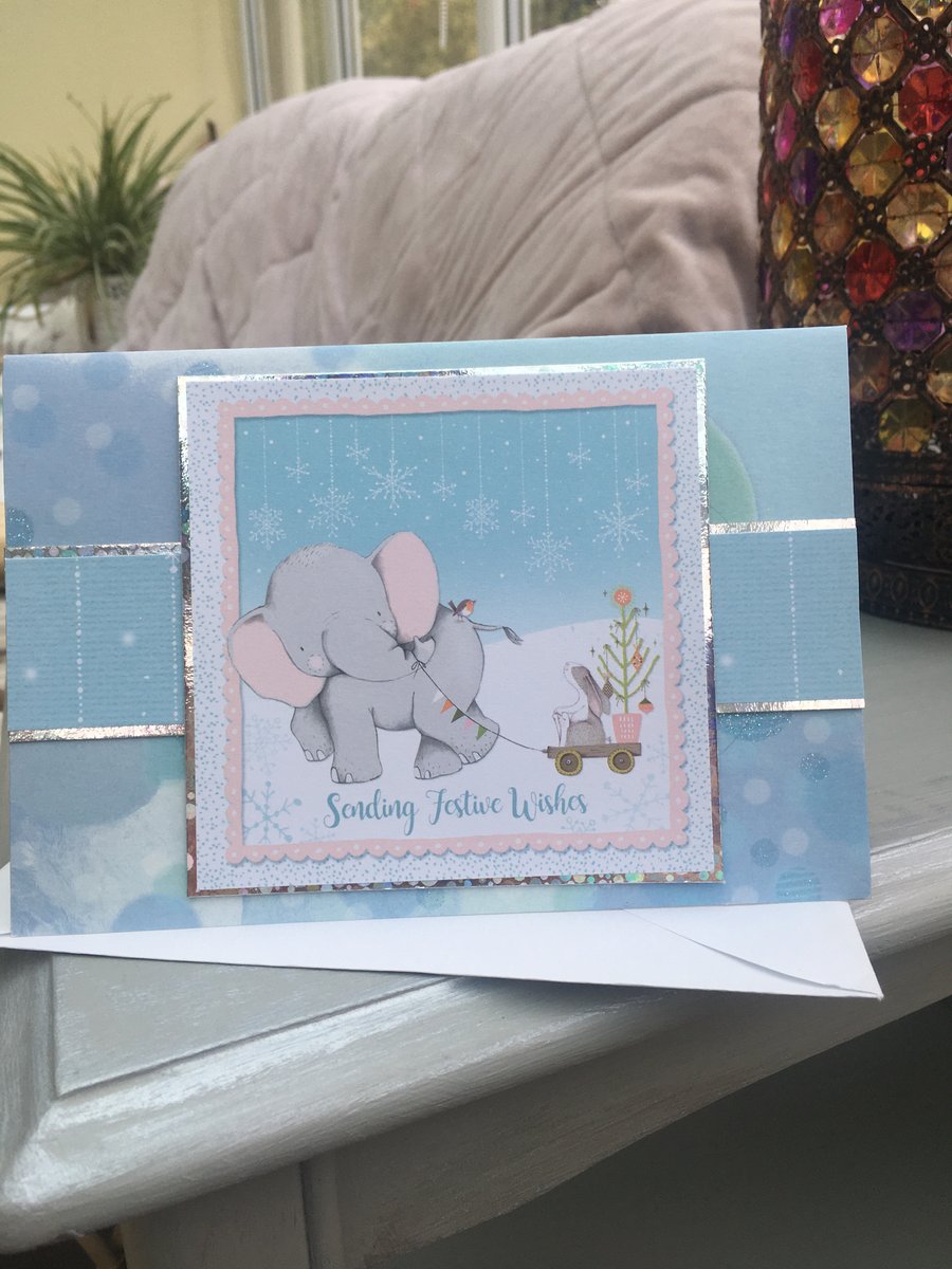 Cute Sending festive wishes Elephant Christmas card.