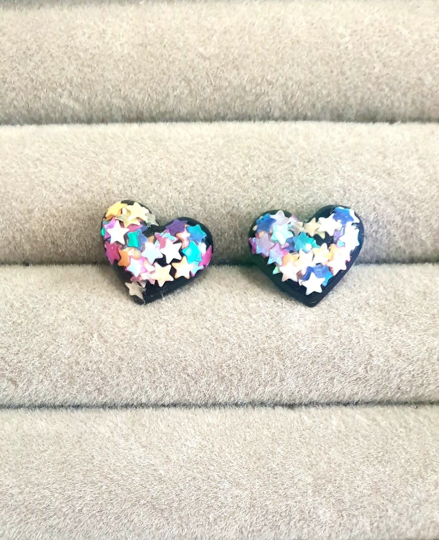 Black multicoloured star stud earrings