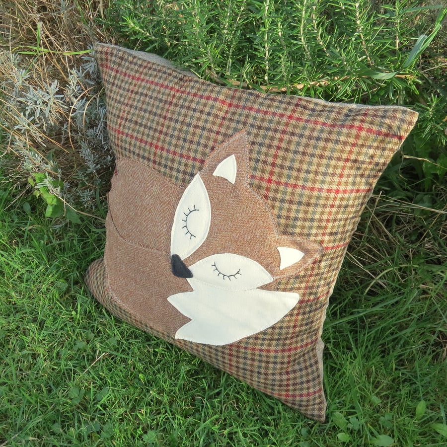 Snoozy fox.  A large statement cushion, complete with feather pad.
