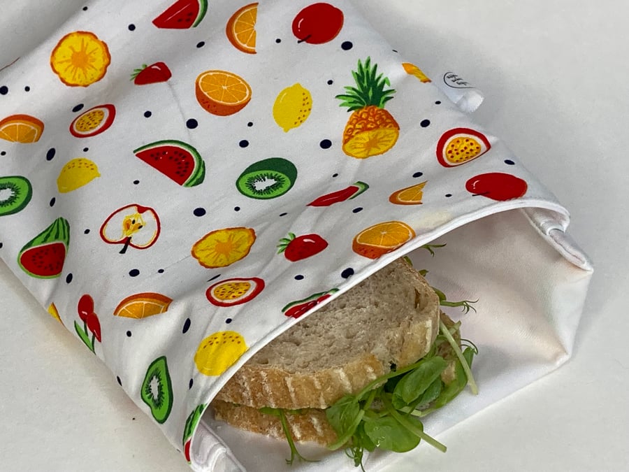 Reusable sandwich bag with food safe lining. Fruity fabric