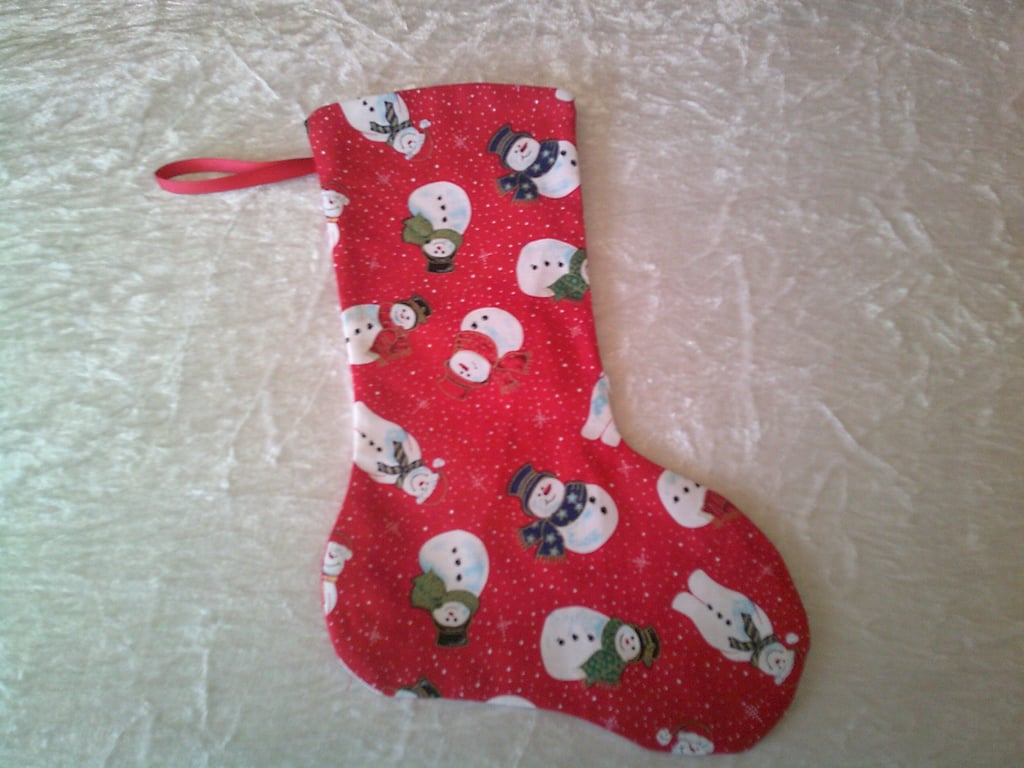 Snowmen on a red background 10.5 inch stocking