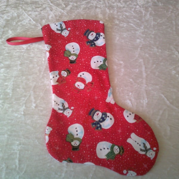 Snowmen on a red background 10.5 inch stocking