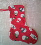Snowmen on a red background 10.5 inch stocking