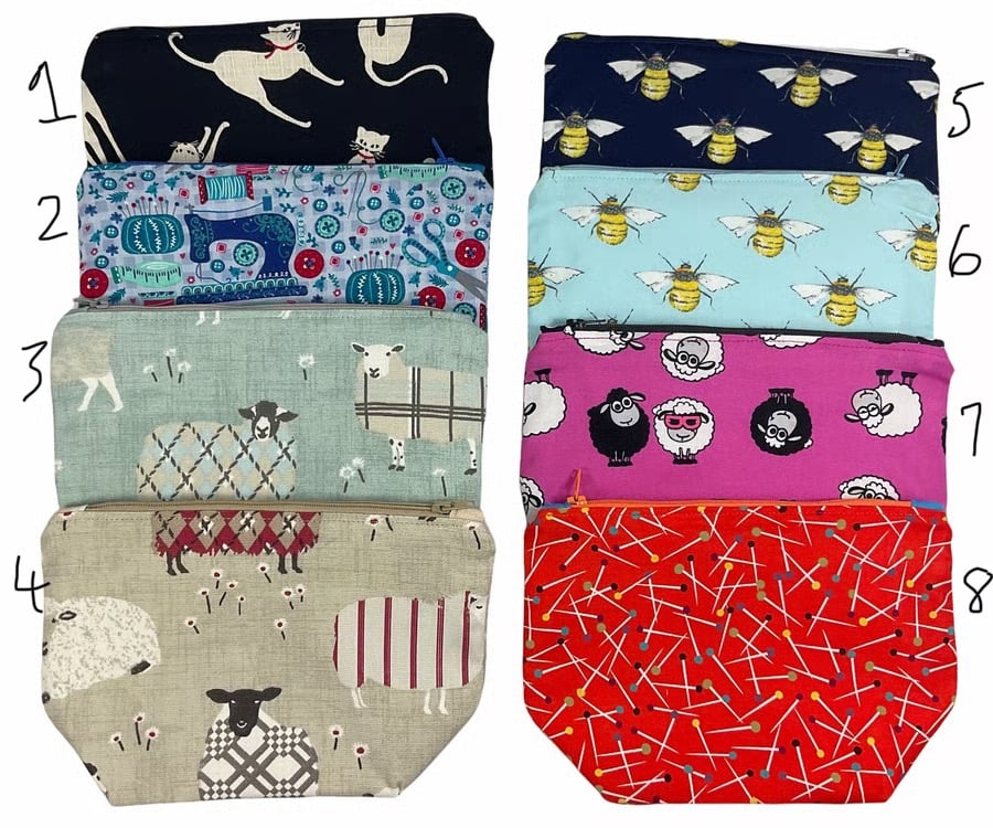 zip pouch for crafting notions and sewing items with a boxed base, knitting item