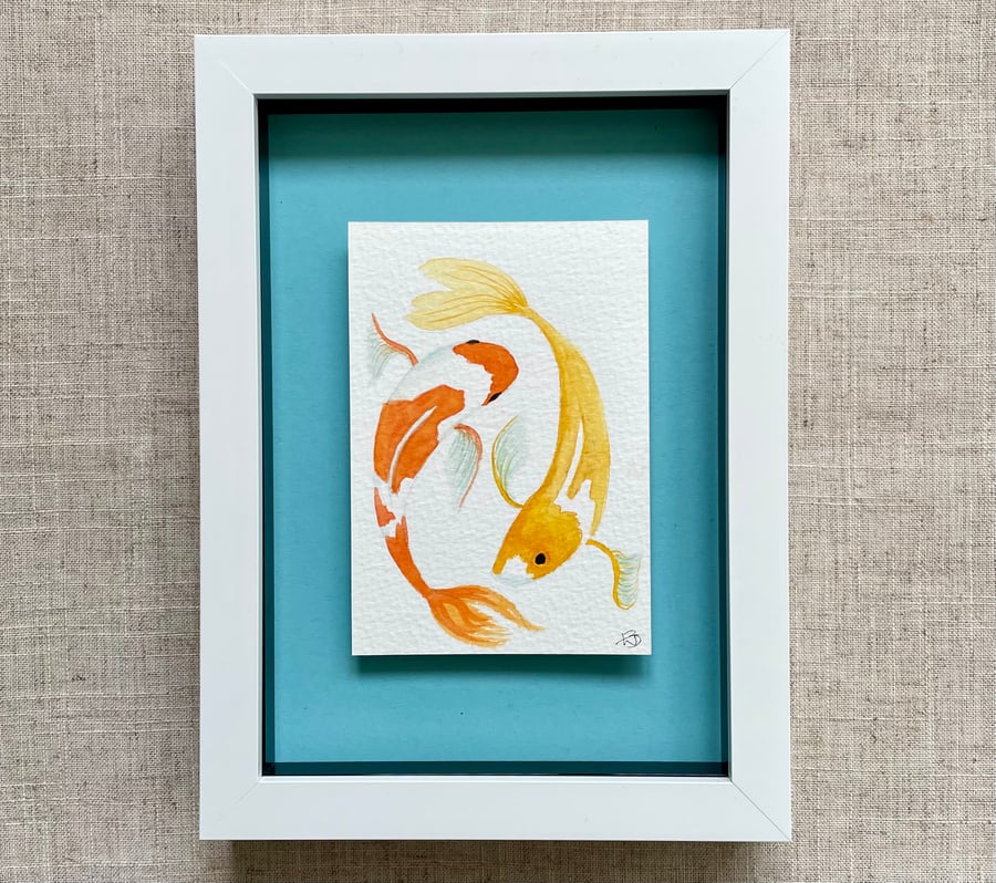 Original art watercolour painting of two koi carp, float mounted onto blue card.