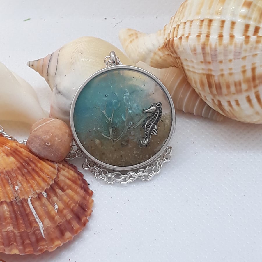 NL238 Resin necklace with sea scape and seahorse