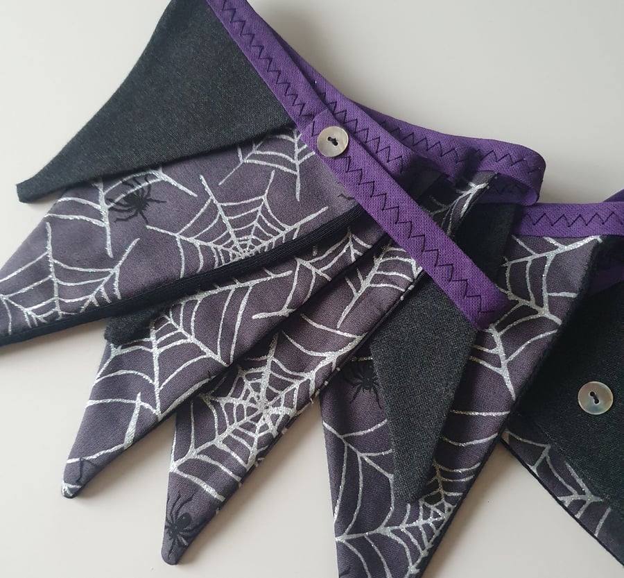Sparkly Cobweb Bunting on Purple Binding