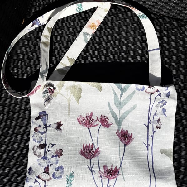 Crossbody shoulder bag with floral print