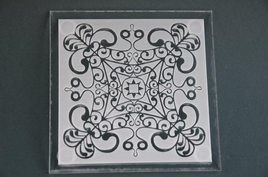 Laser-etched acrylic coasters (white background)