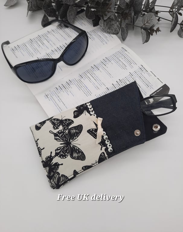 Glasses case, denim and butterfly fabric, beaded detail, popper fastening. 