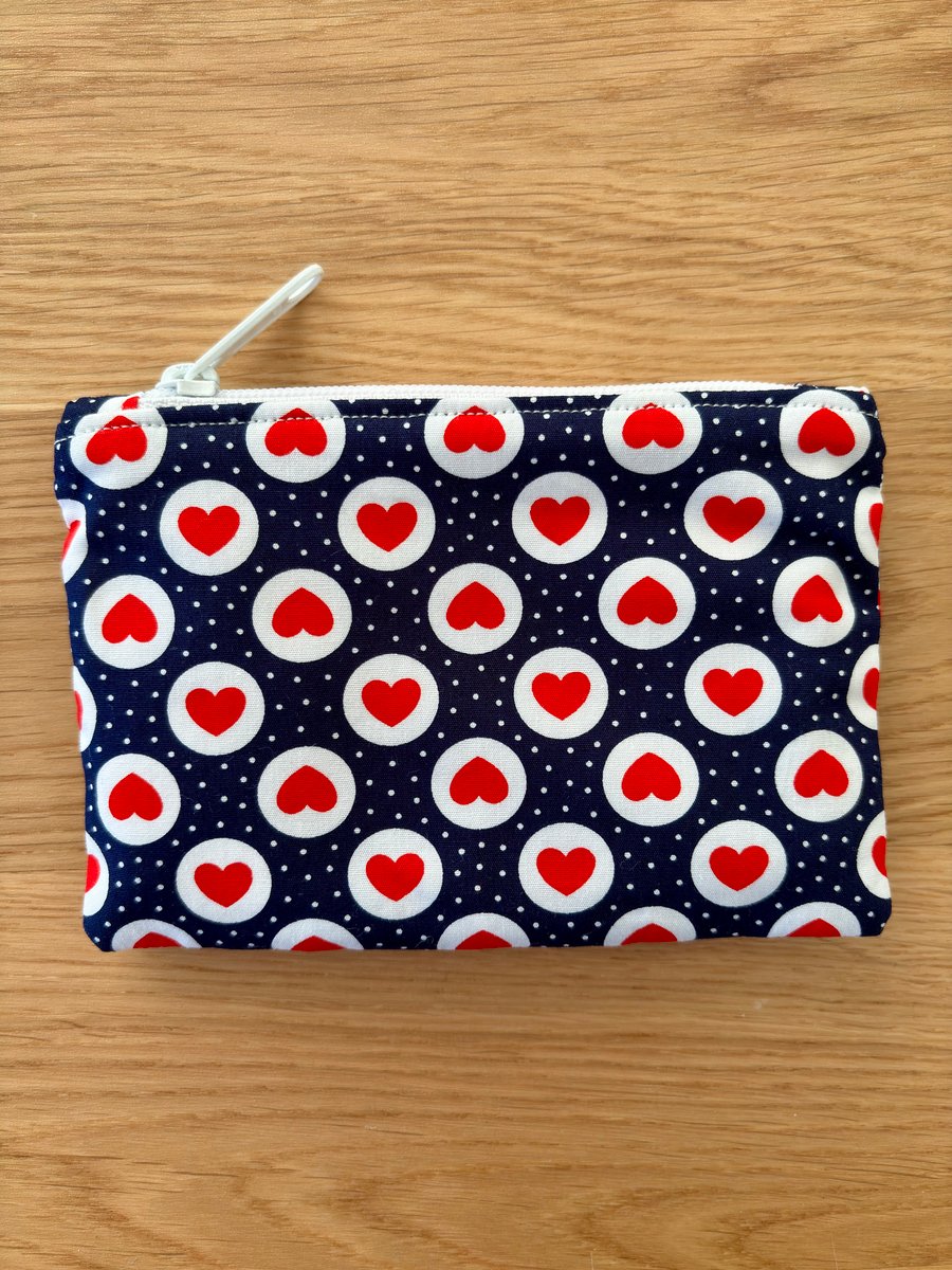 Small zipped fabric purse, pouch, make up bag, in navy with red hearts