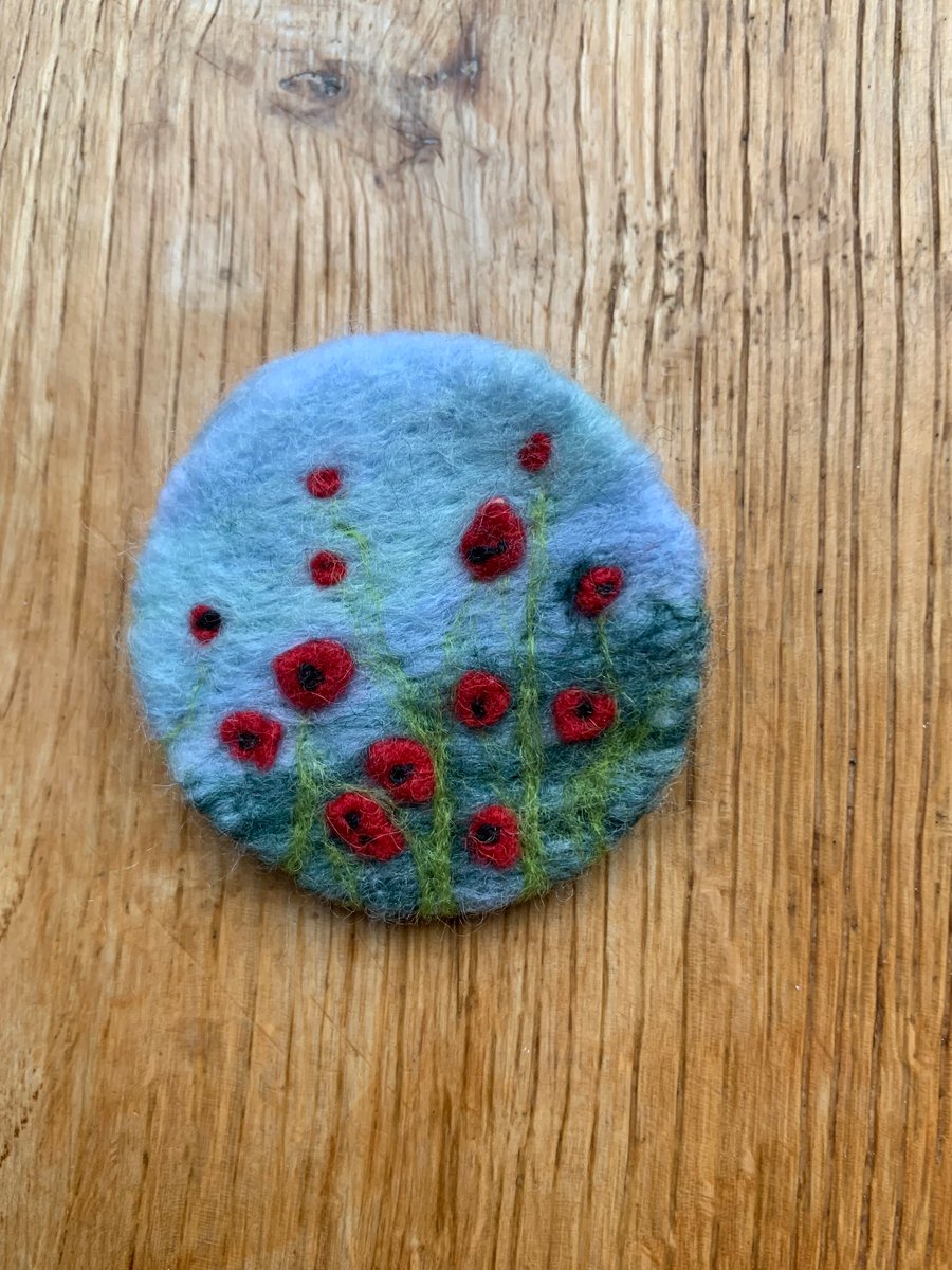 Needle felted poppy brooch