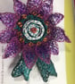 Collectable Commemorative Rosette for Women - Purple, green and white brooch - Image 1