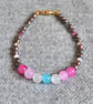Femboy Pride Bracelet with Glass Beads, Pink-Grey Oval Glass Pearls, & Crystals - Image 1