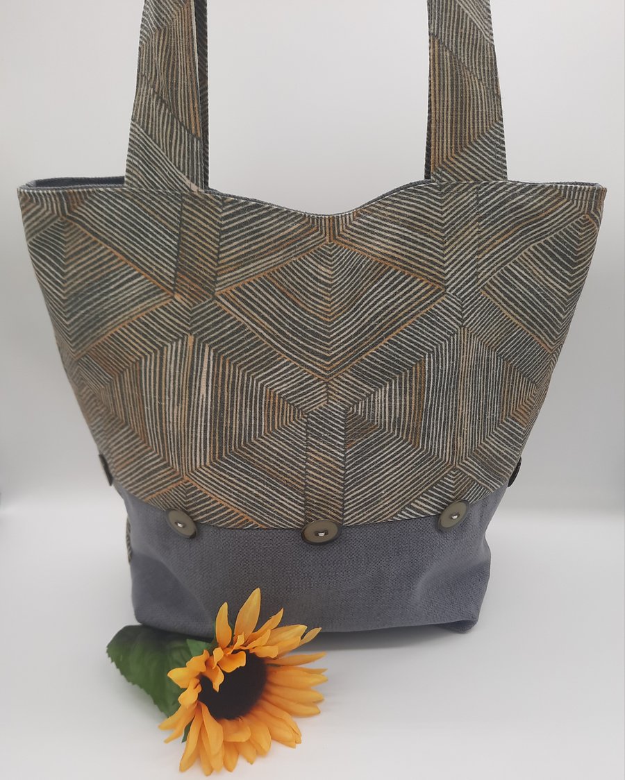 Green, yellow and grey shoulder handbag. 