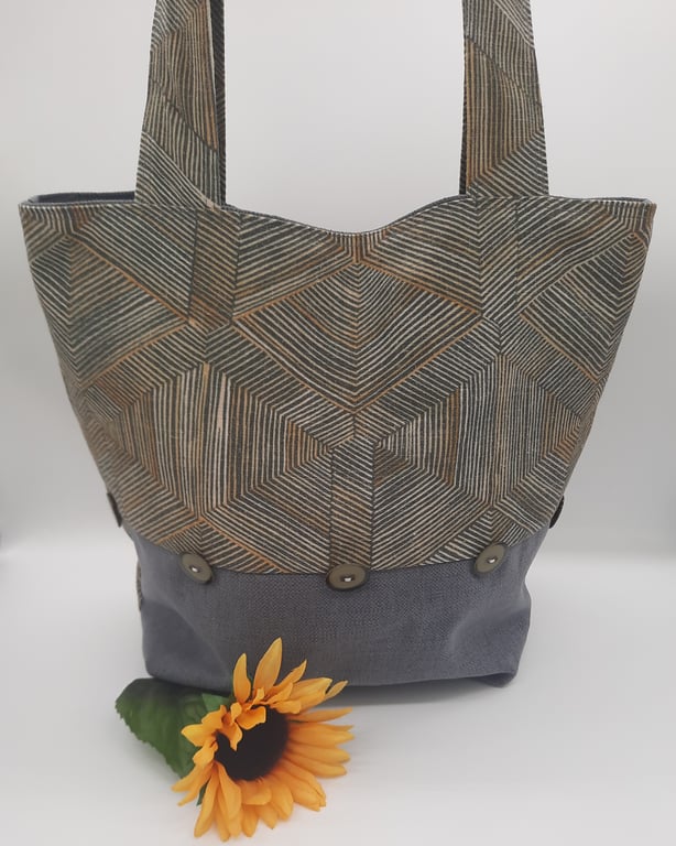 Green, yellow and grey shoulder handbag. 