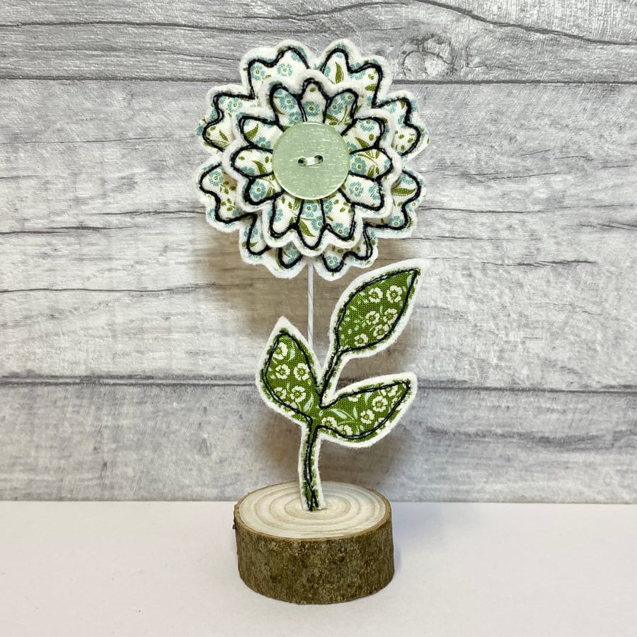 Flower and Leaf on a Wire Stem in a Wooden Stand