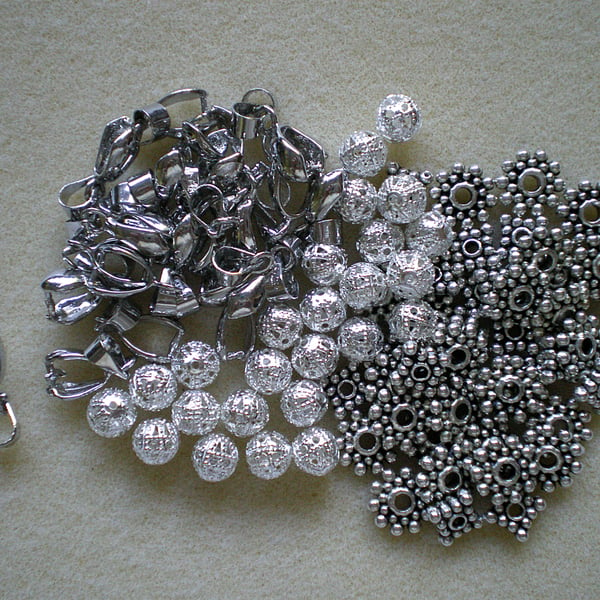 85 Silver Plated Jewellery Findings 22 bails,40 mixed spacers & 24 round spacers