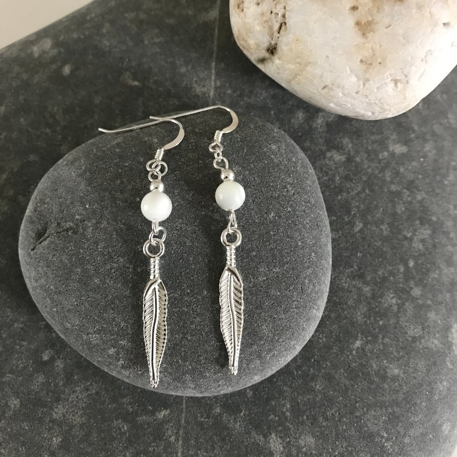 Mother of pearl dangle earrings with feather charms, gift for her