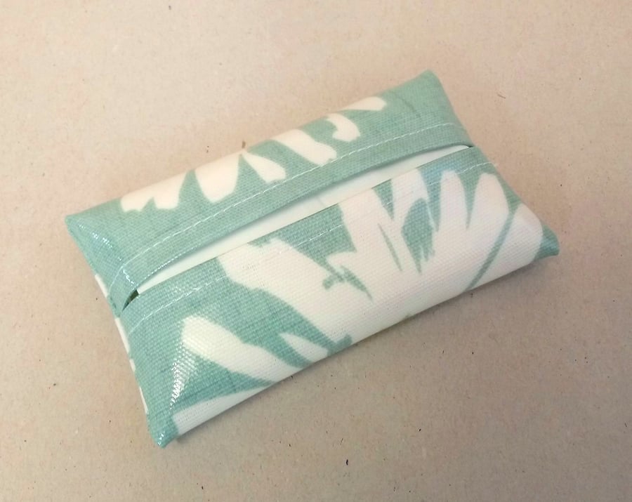 Turquoise tissue holder with daisy pattern, tissues included