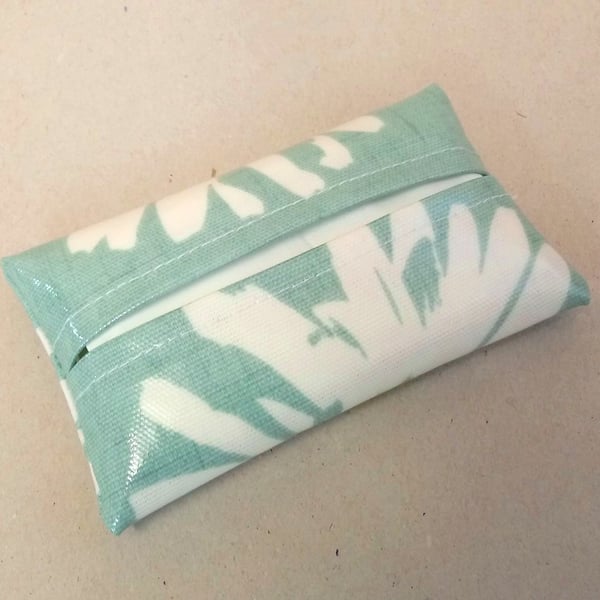 Turquoise tissue holder with daisy pattern, tissues included