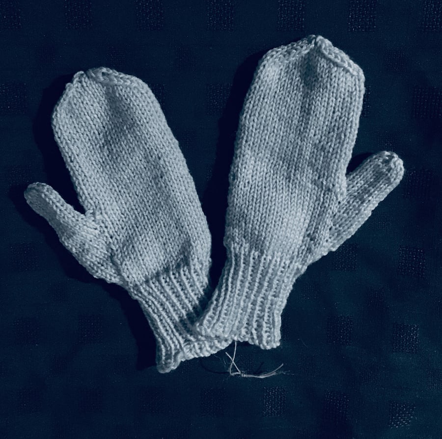 Pale blue hand knit mittens 