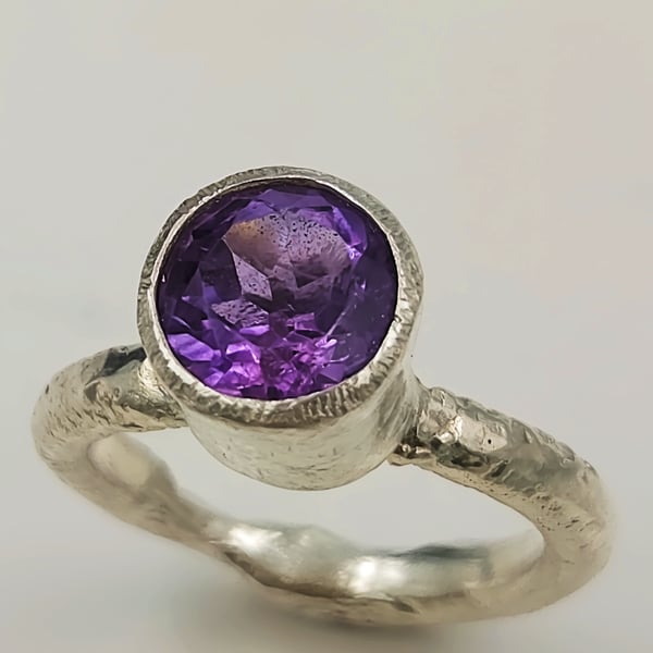 Forged Silver Ring with Faceted Purple Amethyst