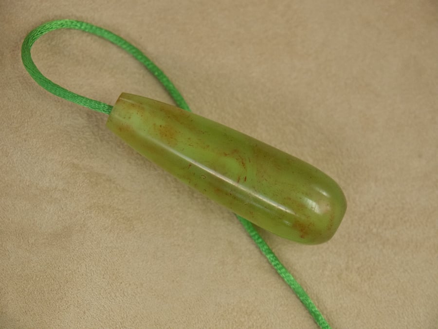 Bathroom light pull inspired by aurora borealis made in Orkney. lpr27