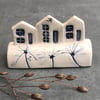 Ceramic row of little houses. 