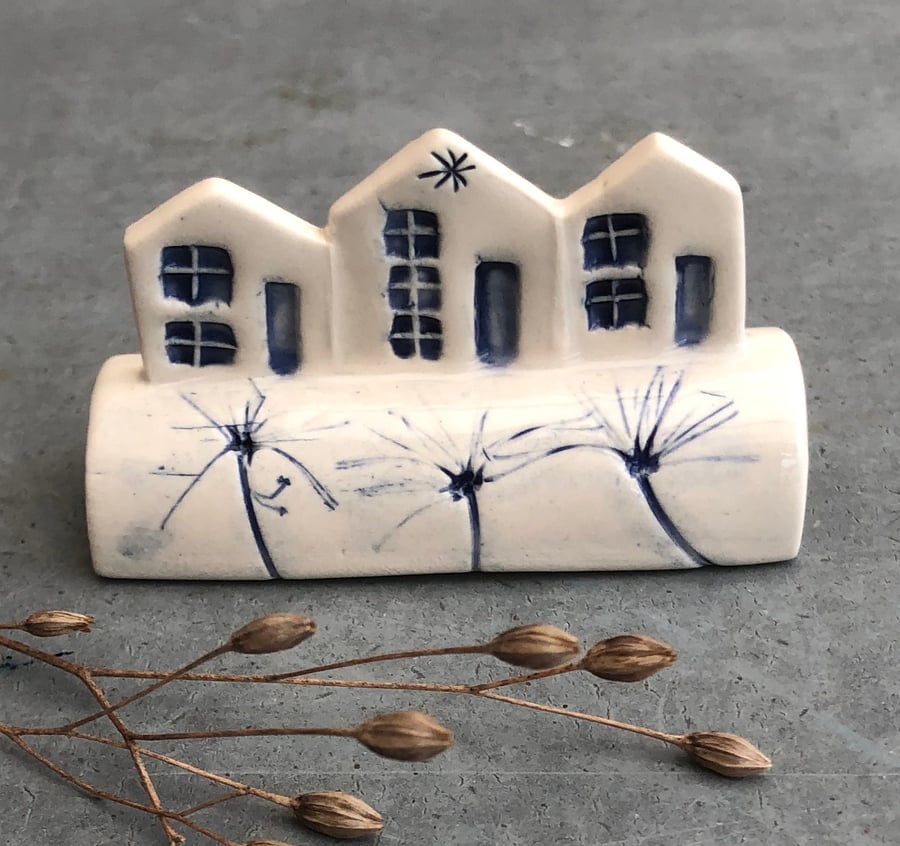 Ceramic row of little houses. 