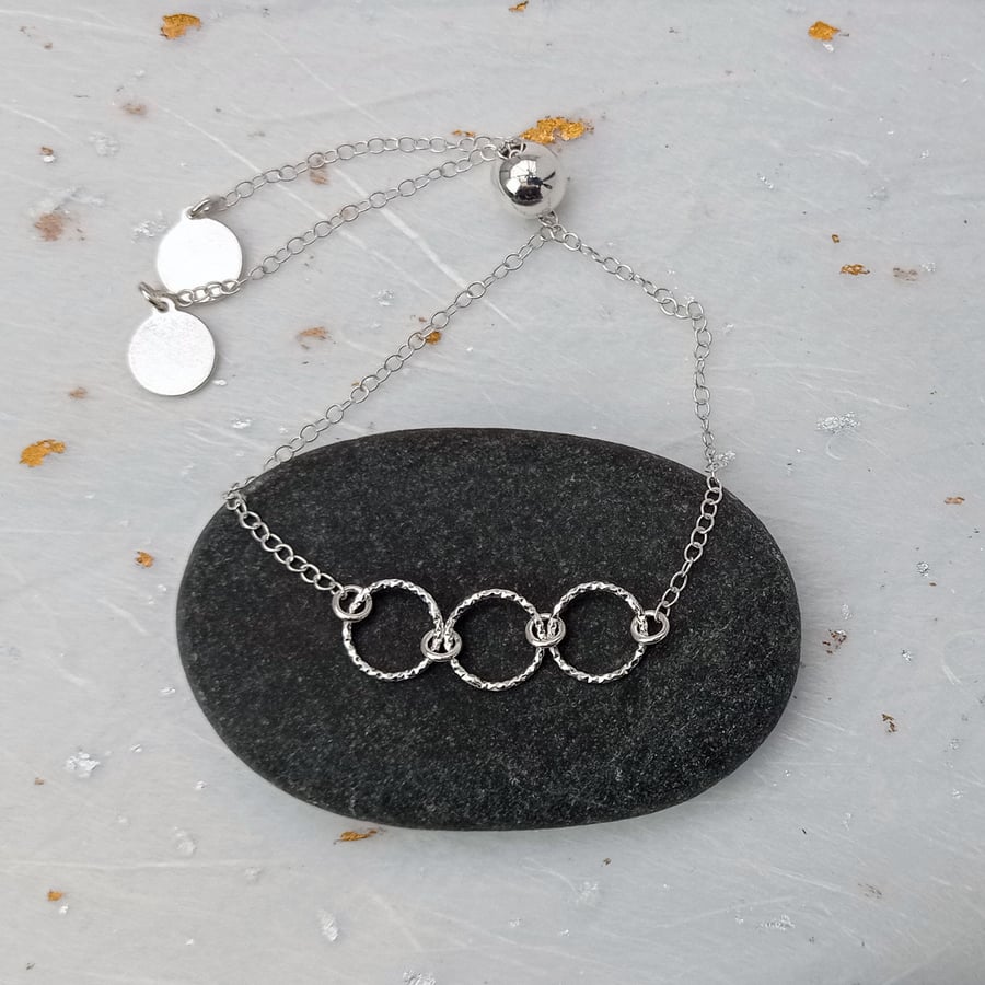 sterling silver diamond cut three ring adjustable bracelet 