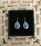 Blue Offset Oval Drop Earrings in Blue - Image 1