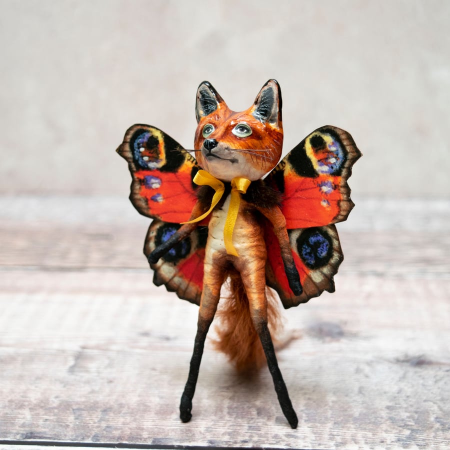 Miniature handmade figurine of a fox butterfly called Kevin