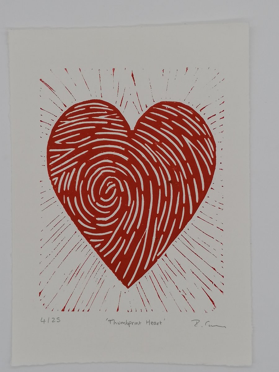 "Thumbprint Heart" lino print. Red on white Paper. Limited Edition of 25.