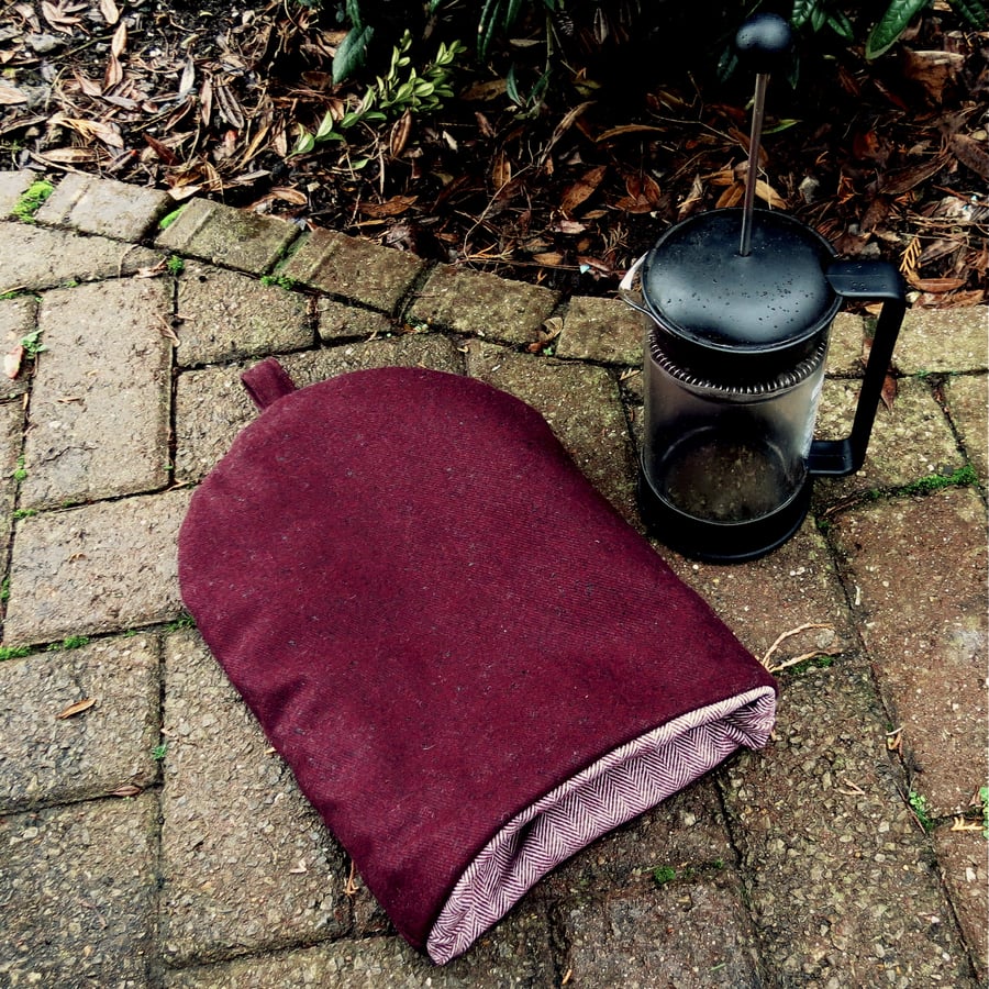 A coffee cosy,  size large.  To fit a 6 - 8 cup cafetiere.  