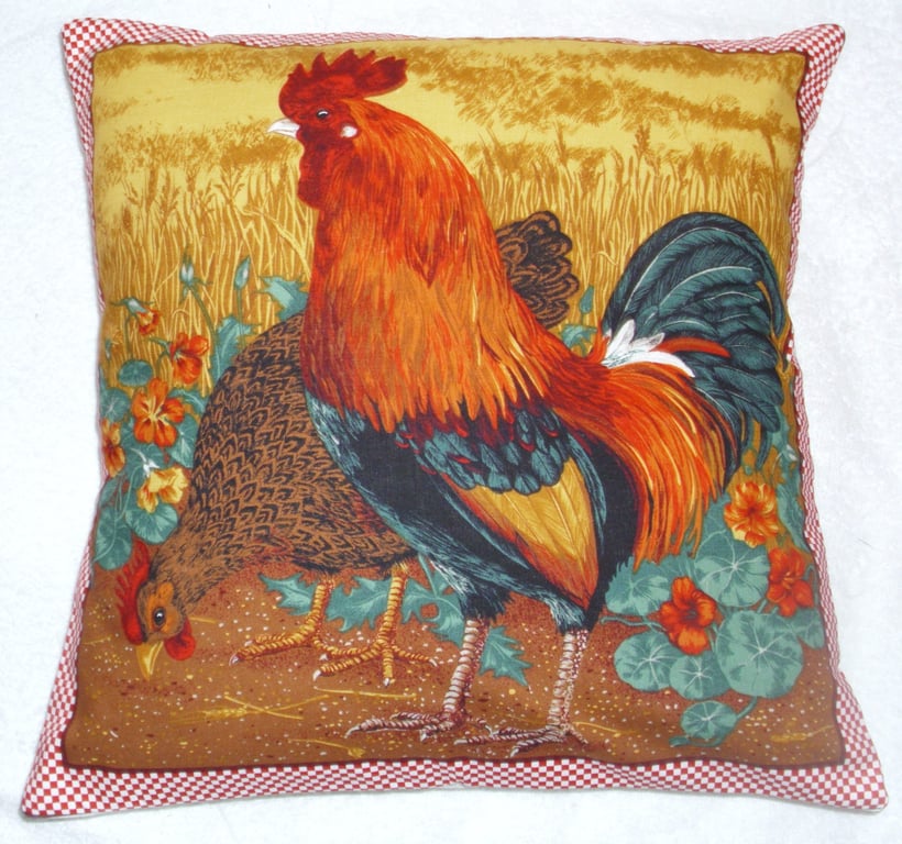 A Cockerel and hen in a field cushion
