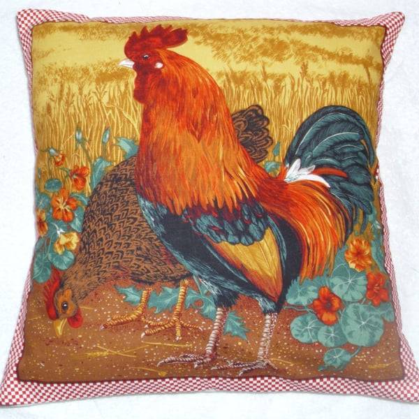 A Cockerel and hen in a field cushion