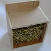Ladybird, bug, insect shelter or house for garden with bamboo shoots.