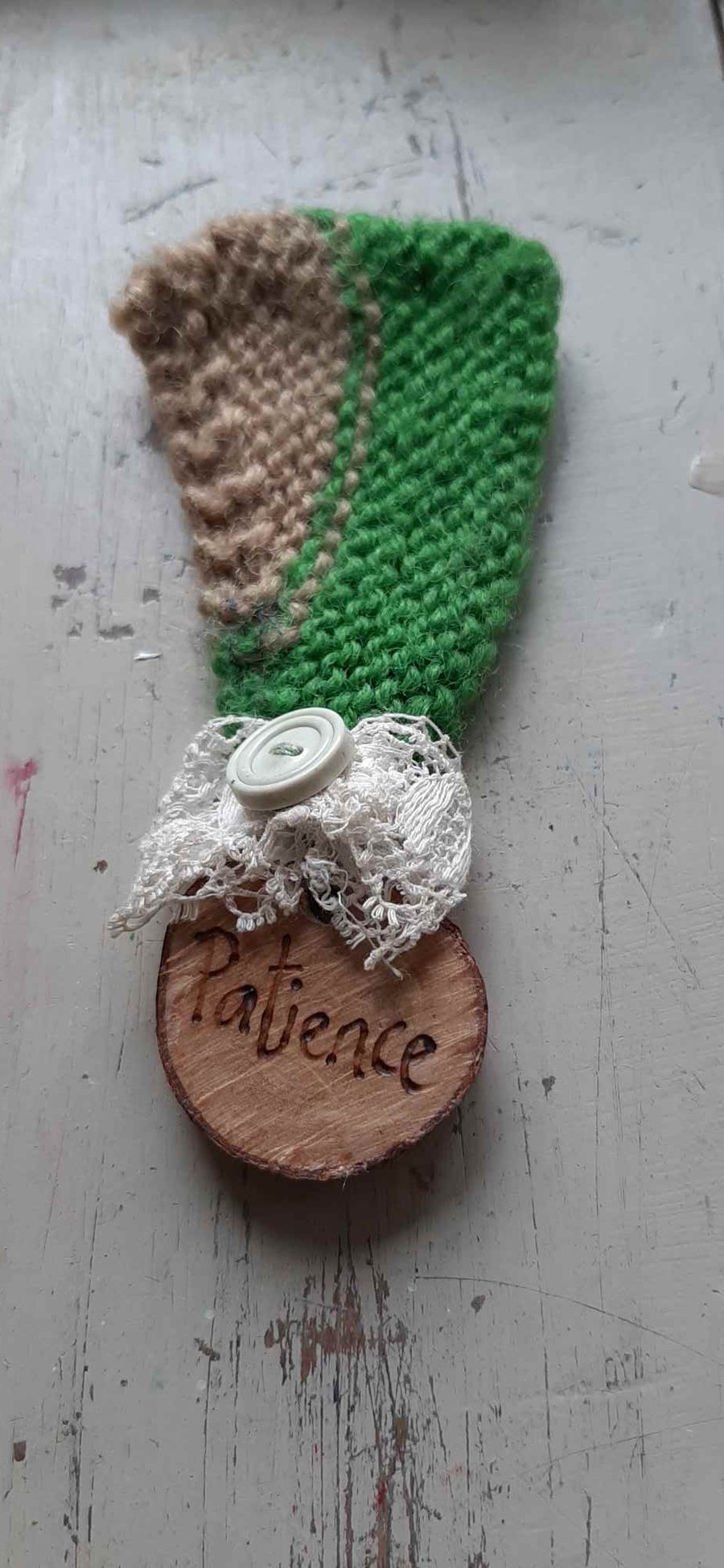 Little patience brooch medal