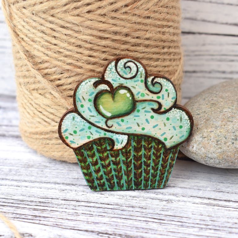 Apple cupcake brooch hand burned using pyrography.