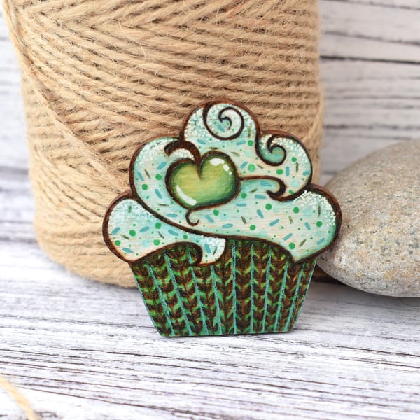 Apple cupcake brooch hand burned using pyrography.