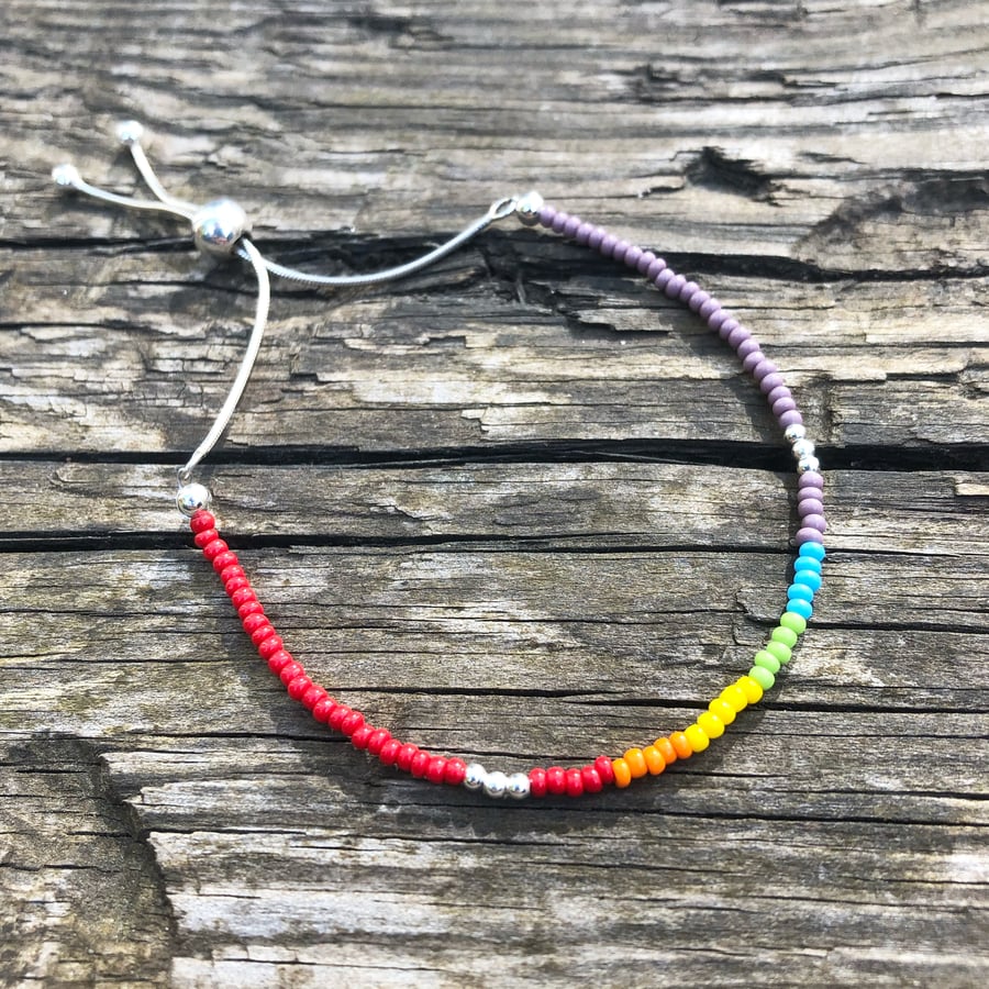 Rainbow seed bead bracelet with sterling silver sliding ball clasp