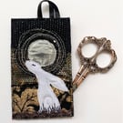 Up-cycled embroidered hare rabbit full moon home decoration.